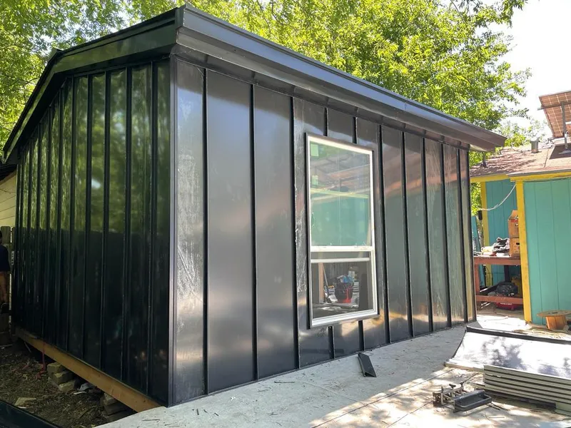 Black standing seam metal wall panels for Metal Roof Installation in Colonie