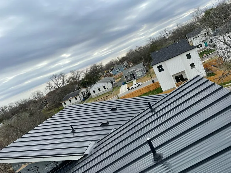Standing seam metal roof panels with vents for Skylight Repair in Colonie